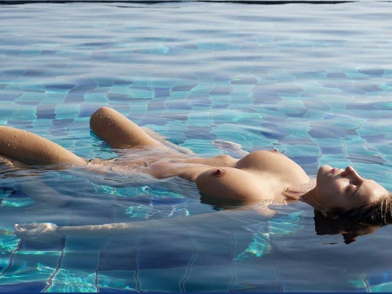 Naked women in water