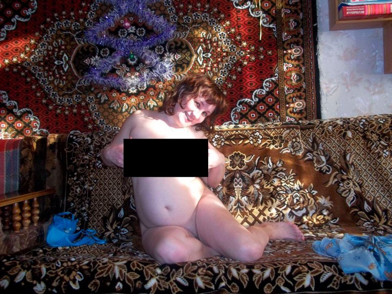 Naked women on the background of carpet