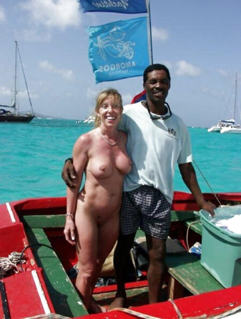 Girls with blacks on the beach nude