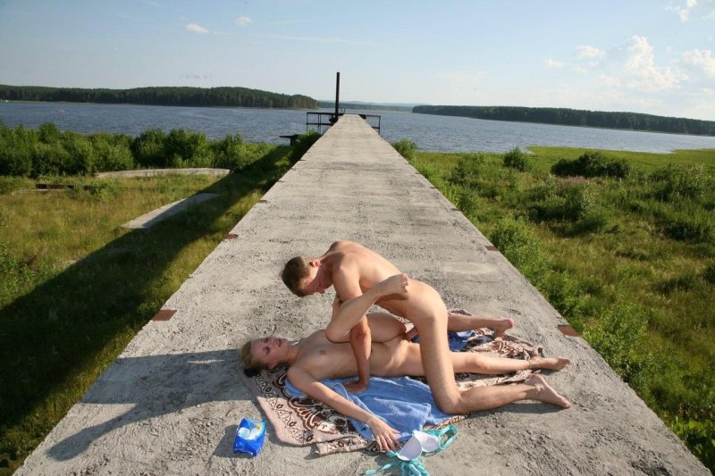 Naked on a rustic beach