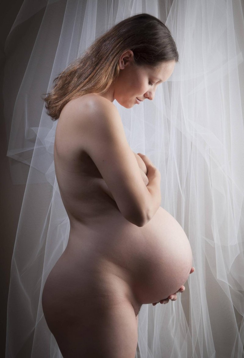 Photo session of a pregnant Nude