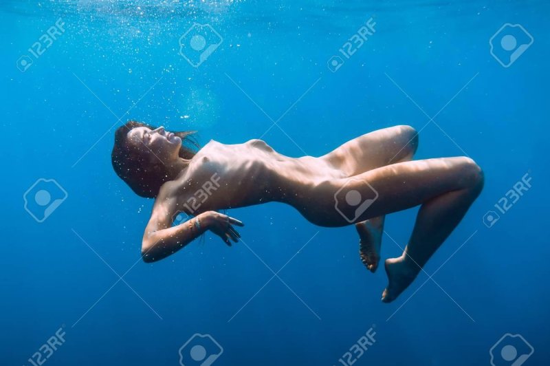 Naked women under water