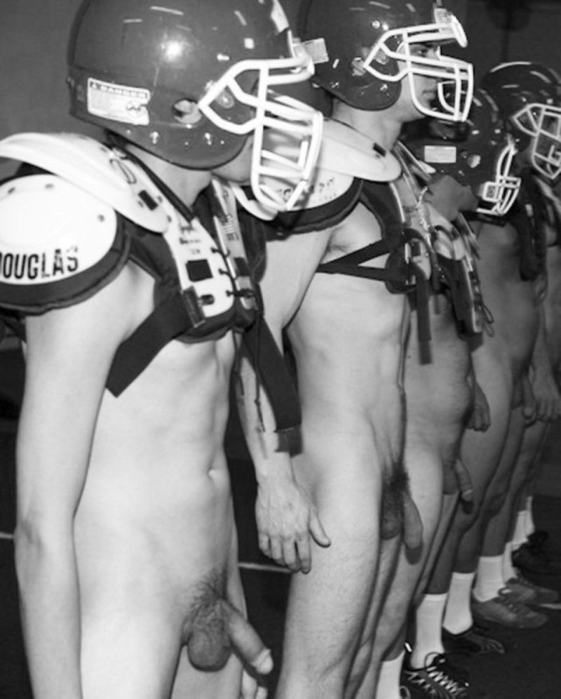 Naked football players in the locker room