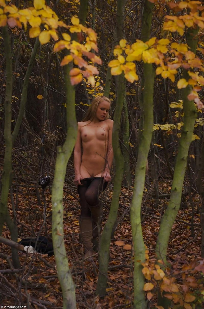 Naked photo shoot in the autumn forest