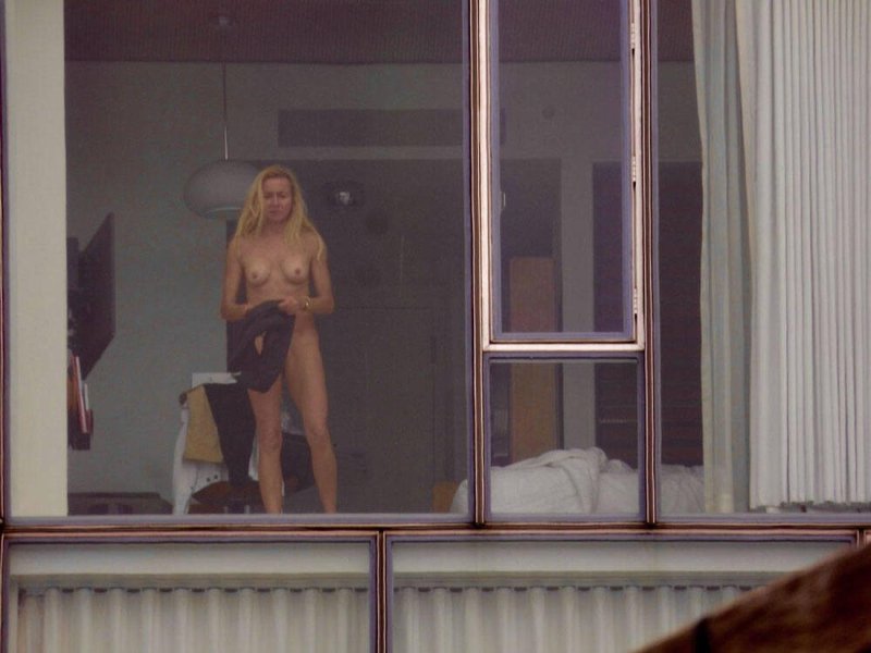 Peeping out the windows naked