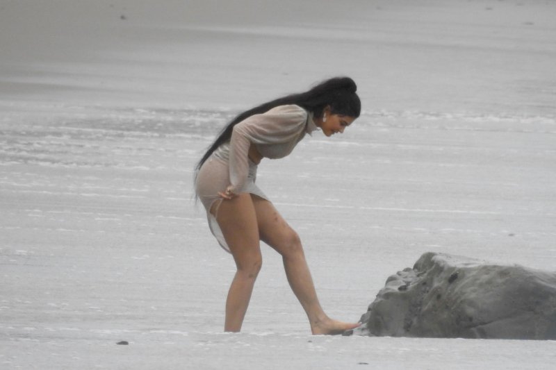 Kylie Jenner on the beach of paparazzi