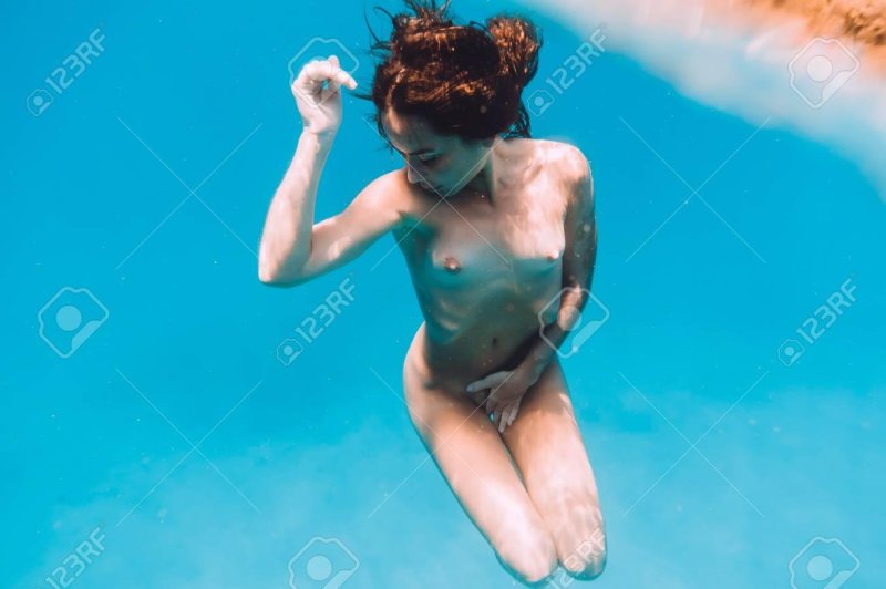 Naked women under water
