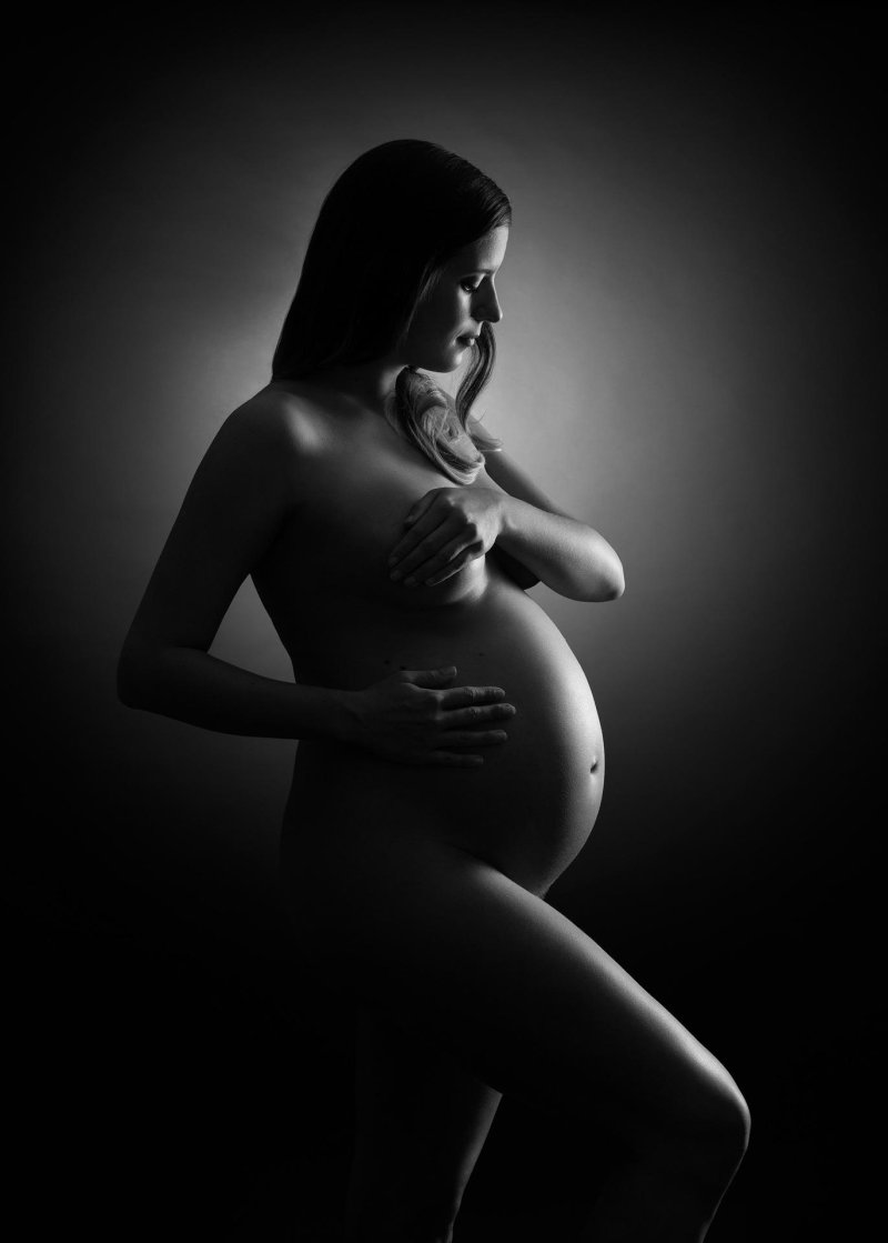 Photo session of a pregnant Nude
