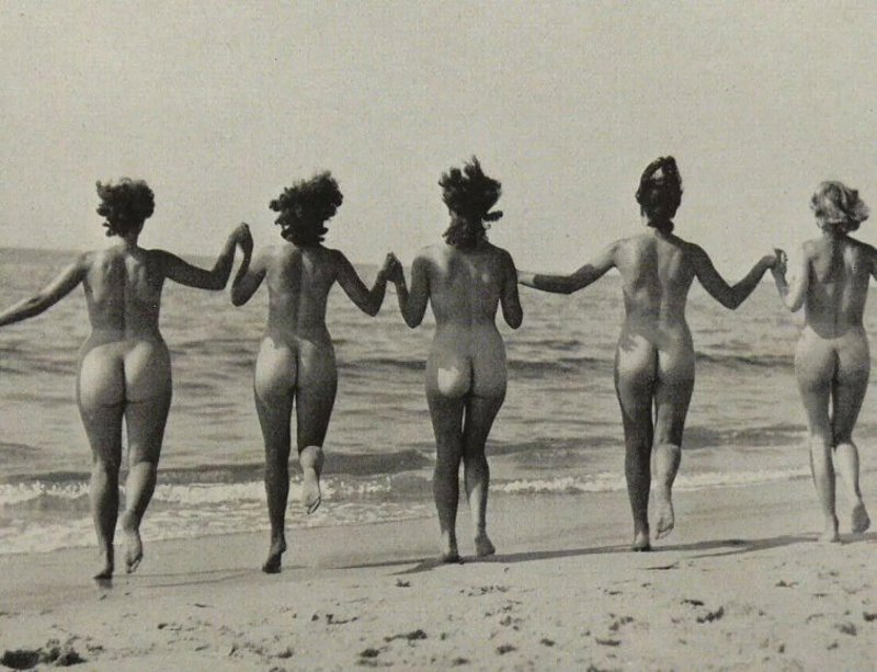 Naked women on the beach retro