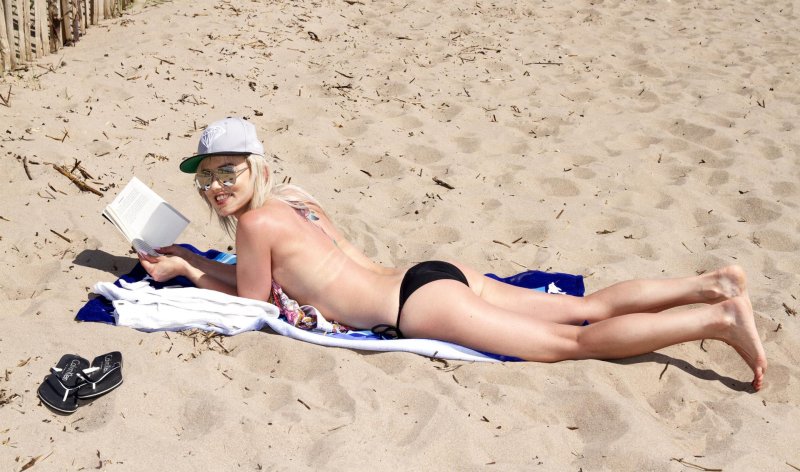 In a bikini on the beach