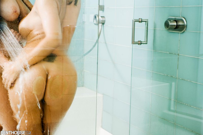 Naked women wash in the shower