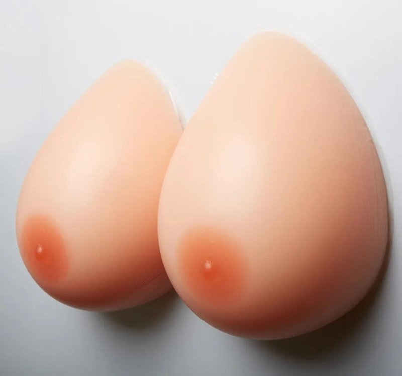 Silicone overhead breasts